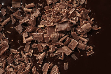 Molten chocolate as background, closeup