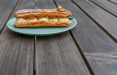 Cream fresh national Paris Brest tasty baked treat on plate