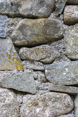 Stone fence texture background in the Vitosha Mountain village of Chuypetlovo, Bulgaria