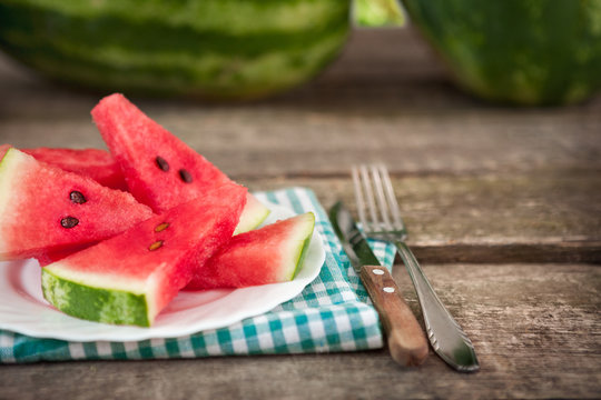 Watermelon slice with cutlery