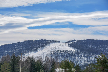 Divcibare mountain in Serbia winter season with ski trail in the distant