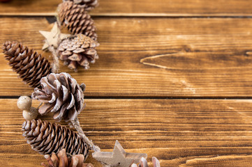 pinecones with wooden background