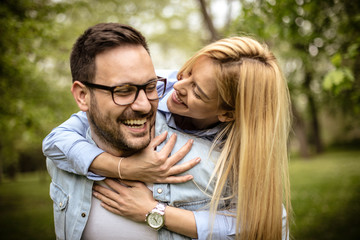 Fototapeta premium Couple playing at park.