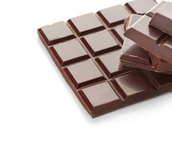 Pieces of dark chocolate on white background
