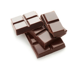 Pieces of dark chocolate on white background