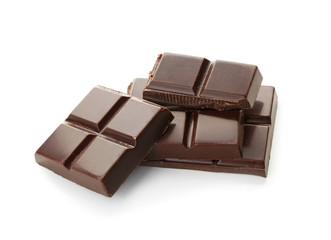 Pieces of dark chocolate on white background