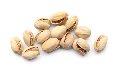 Tasty pistachio nuts on white background