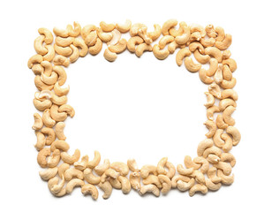 Frame made of tasty cashew nuts on white background