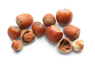 Tasty hazelnuts on white background