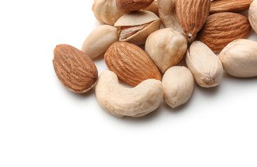 Different types of nuts on white background
