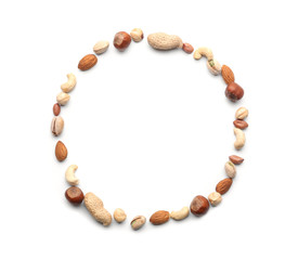 Frame made of different types of nuts on white background