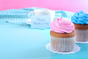 Delicious cupcakes on table. Mother's Day celebration