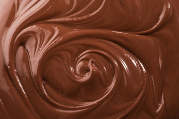 Obraz na płótnie Canvas Tasty melted chocolate as background