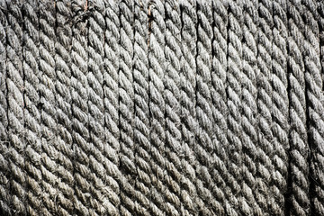 full frame of arranged grey ropes background