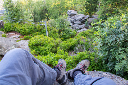 Man legs and shoes on vantage point Mandelstein, Austria