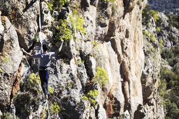 Walk a line in the sky.Turkish Highline Carnival in Antalya.