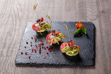 Salami canape with cucumber