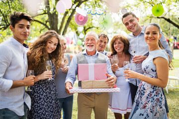 Family celebration or a garden party outside in the backyard.