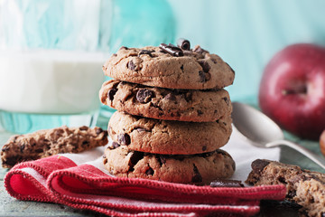Cookies for breakfast on old cyan wooden table