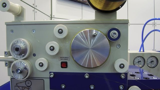 Electrical discharge machining EDM Wire feed mechanism.