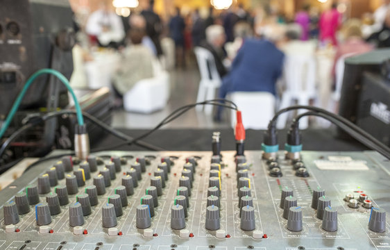 DJ Soundboard At Work White The Guests Are Dinning