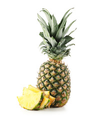 Whole fresh pineapple and slices on white background