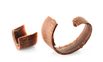 Delicious chocolate curls on white background