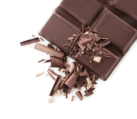 Chocolate bar with curls on white background