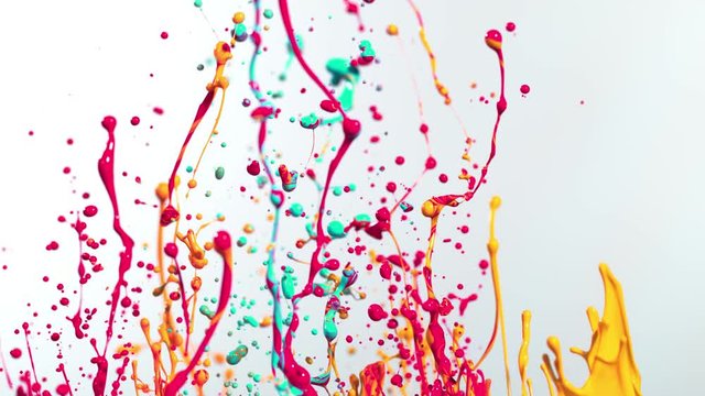 Colorful splashing paint in super slow motion. Shot with high speed cinema camera, 1000fps