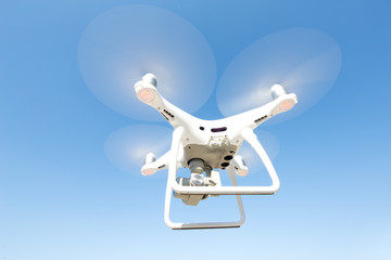 drone quadcopter with blue sky
