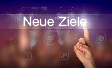 A businessman pressing a New Goals 