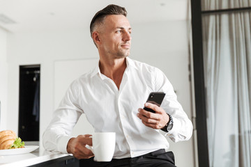 Smiling man dressed in formal clothes