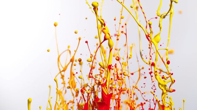 Colorful splashing paint in super slow motion. Shot with high speed cinema camera, 1000fps