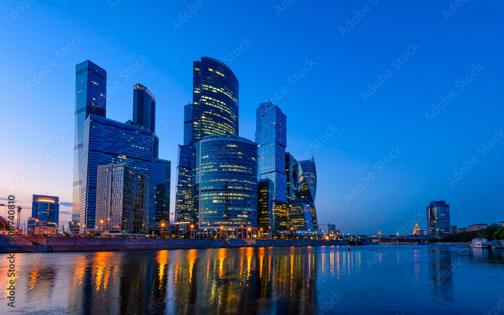 Wall mural Skyscrapers of Moscow City business center and Moscow river in Moscow at night, Russia