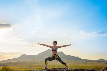 Young girl doing yoga outdoor