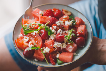 Man holding fresh healthy salad