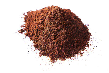 Pile of the ground coffee flakes isolated over the white background. Top view 