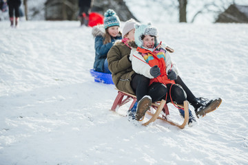 Children in a Sled Race