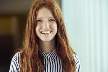 Young woman smiling, portrait