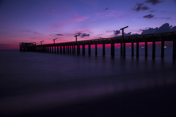 Bridge in sunset at Mae Ramphueng Beach,Rayong Province,Thailand