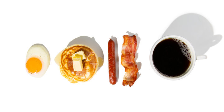 Creative layout - breakfast essentials on white background
