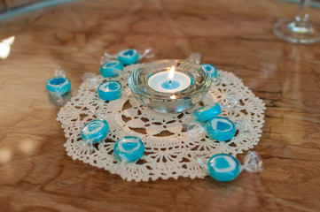 lightblue candle with blue candy