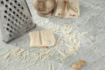 Delicious white chocolate and shavings on table