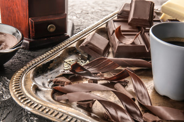 Tray with delicious chocolate and cup of coffee, closeup