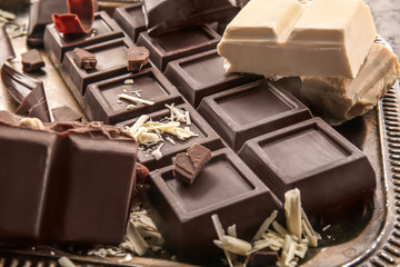 Different delicious chocolate, closeup