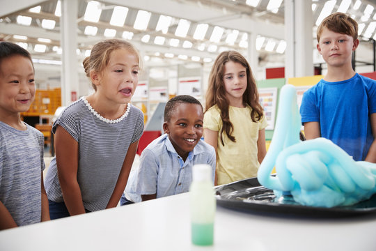 School Kids Watching Experiment At Science Centre, Close Up