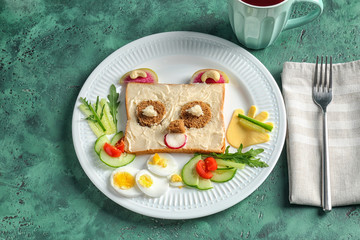 Creative breakfast for children on plate. Recipe ideas with bread