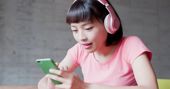 woman enjoy listen music