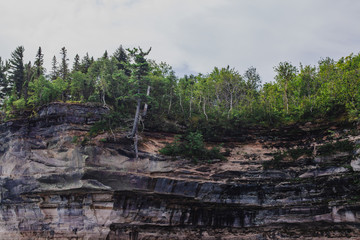 Pictured rocks national park on the Lake Superior, USA. Colorful textured rocks background