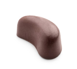 Tasty dark chocolate candy on white background